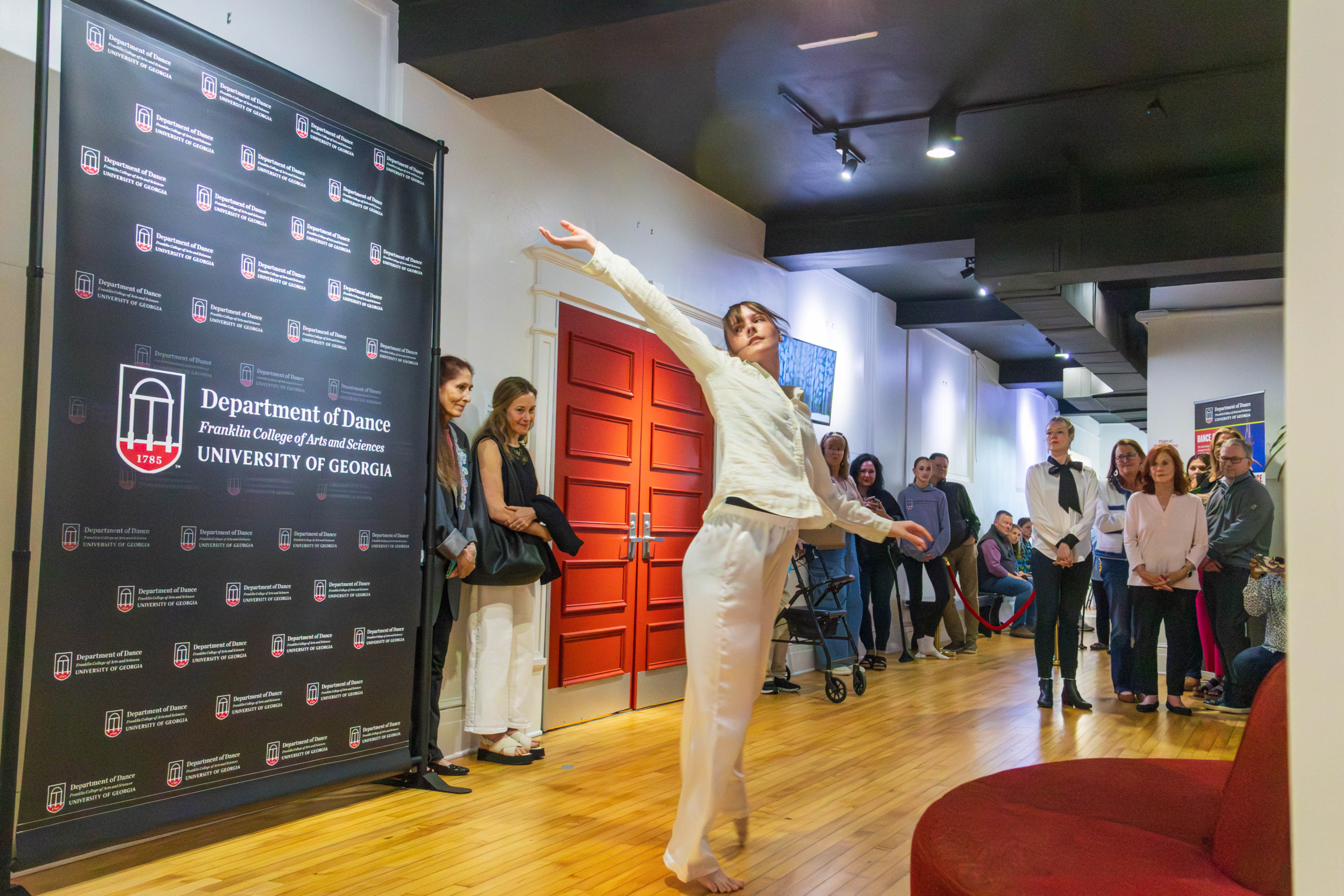 A UGA Dance student performs in the newly named Riden Lobby at the UGA Dance Building.