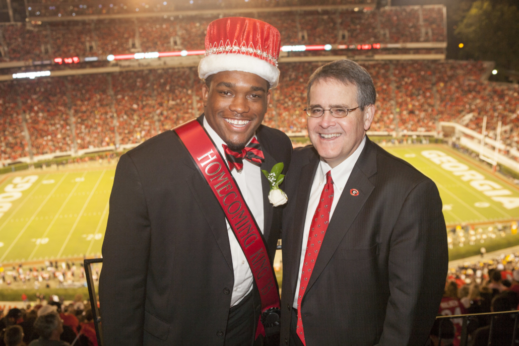 Johnelle Simpson stands with UGA President Jere W. Morehead after being voted UGA Homecoming King in 2015.