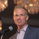 A photo of Matt Garrett speaking at an event