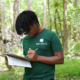 A 4-H student participates in wildlife judging
