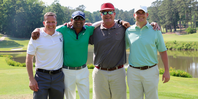 Golfers posing