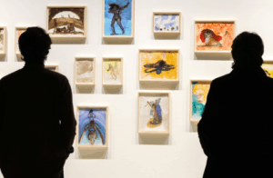 photo of people looking at an art gallery