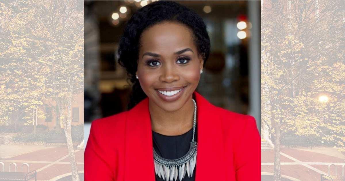 Dr. Davetrina Seles Gadson with Aderhold Hall in the background