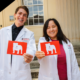 Photo of CVM students in their white coats