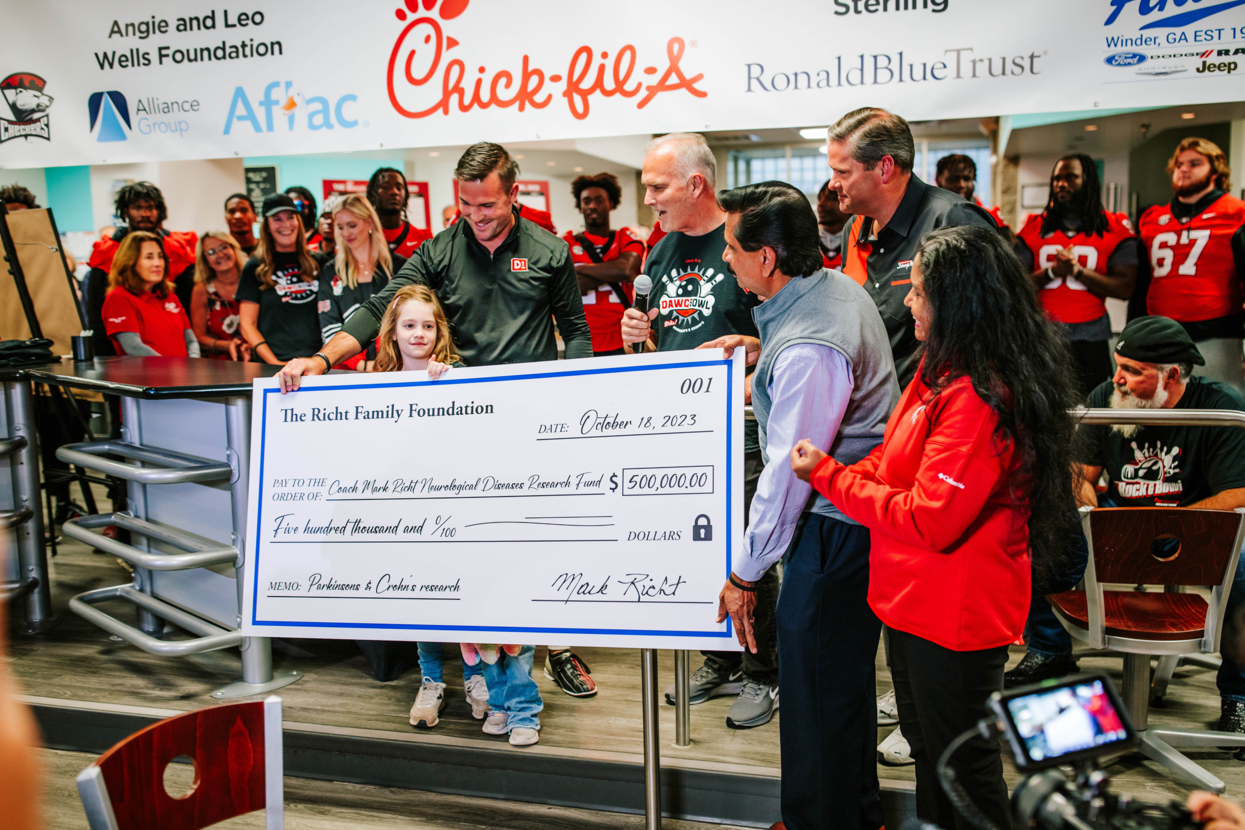 Photo from the Dawg Bowl 2023 check presentation