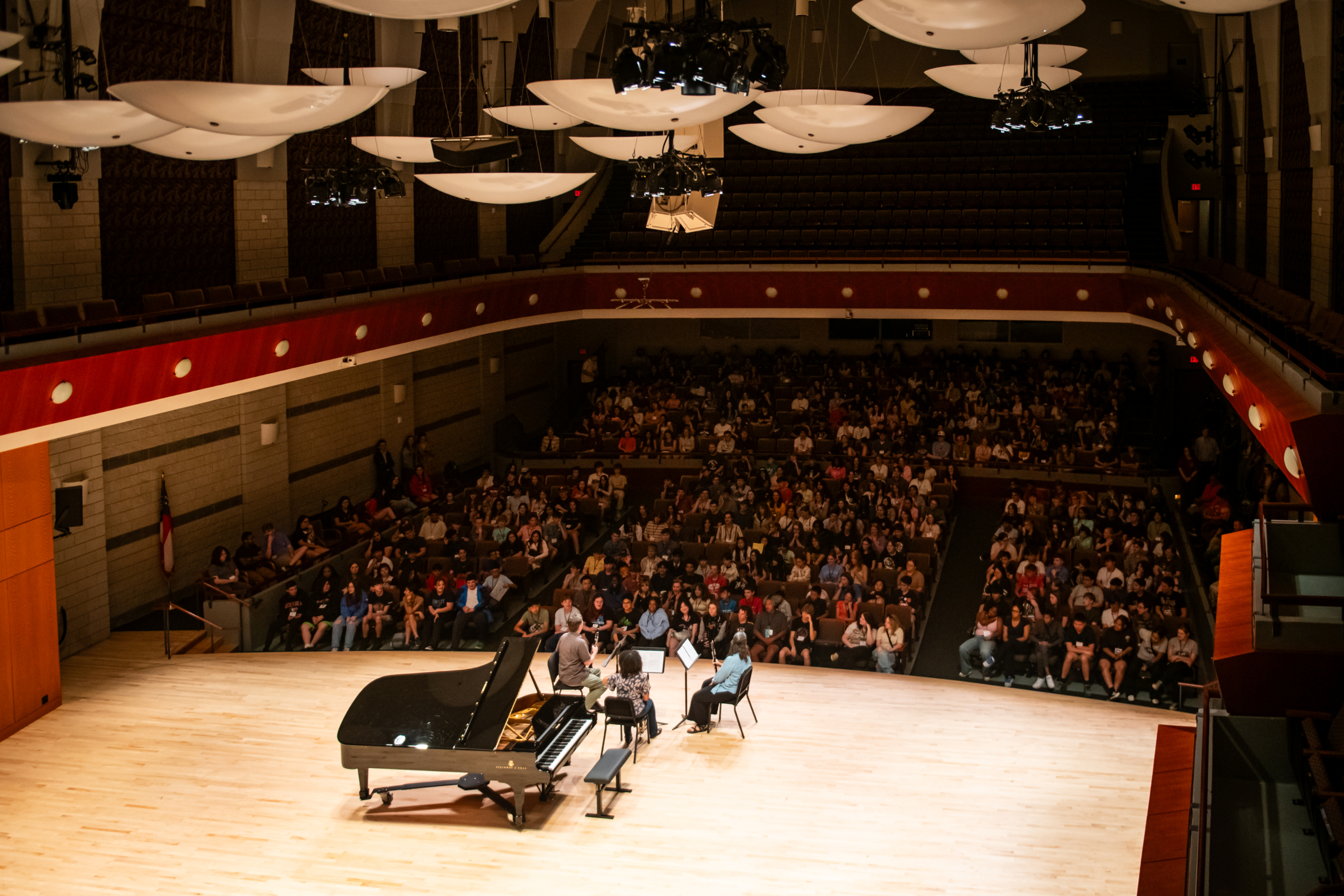 And overhead view of musicians performing in front of an audience in Hodgson Hall on UGA's campus.