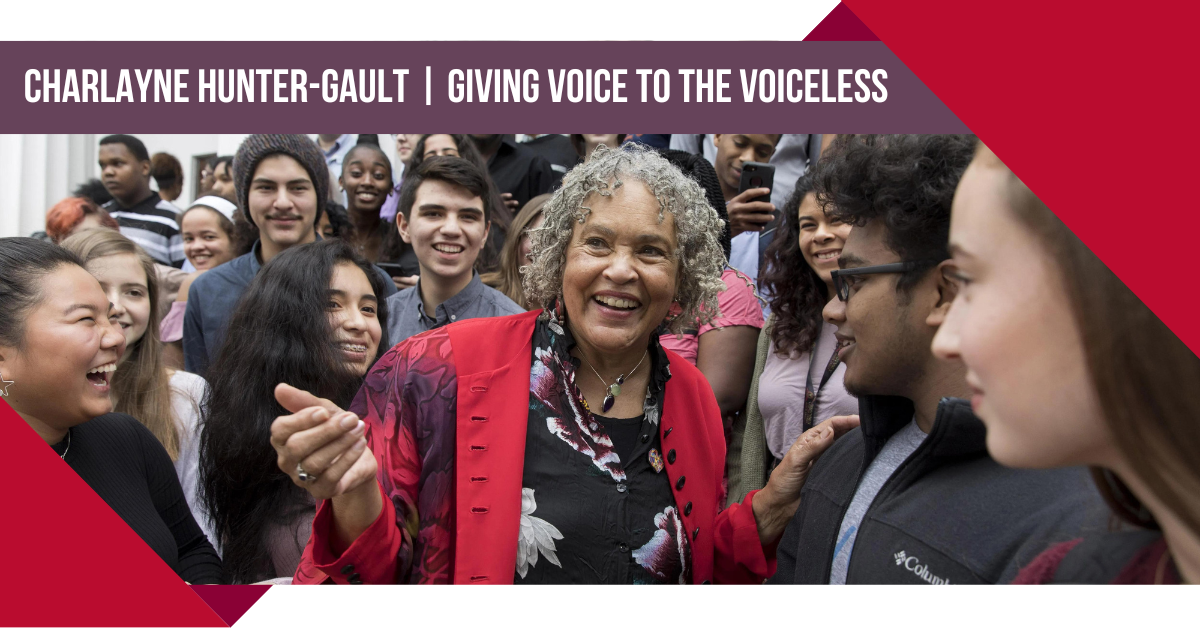 Charlayne Hunter-Gault smiles around students