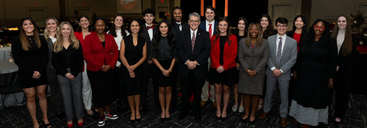 President Morehead and student ambassadors at Presidents Club Reception