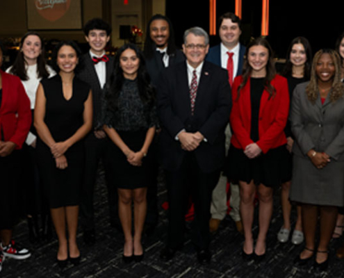 President Morehead and student ambassadors at Presidents Club Reception