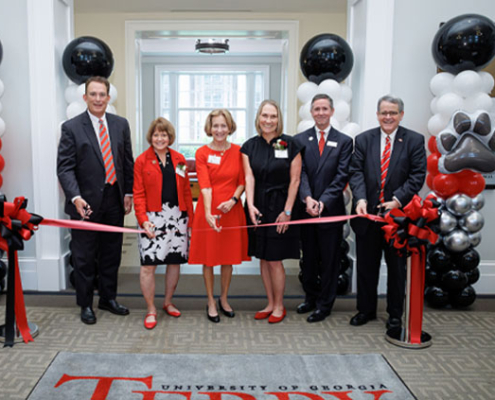 Terry College Dean Ben Ayers, Terry Family Foundation President Betsy Cox, Terry Family Foundation Trustee Kathleen Cold, Executive Vice President Kathleen Shaw, RMI Program Director Jim Carson and UGA President Jere Morehead cut the ribbon dedicating the C. Herman Terry Risk Management and Insurance Program.