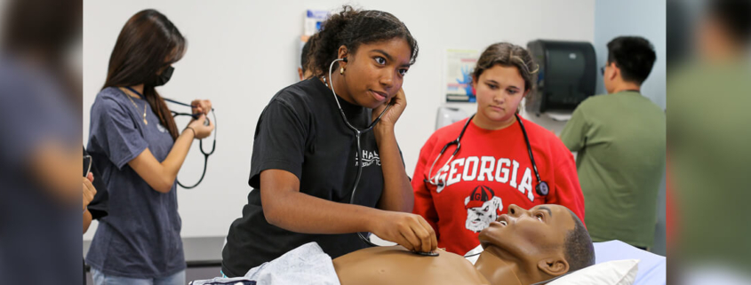 Students at UGA mini medical scholl camp practiced medical simulations on mannequis during Summer Academy at UGA, facilitated by the UGA Center for Continuing Educaiton & Hotel. The AU/UGA Medical Partnership used half of its funding from the Sahm Award during summer 2022 to pay for three tennagers to attend the summer camp on the medi school campus in Athens (Photo: Shannah Montgomery/ PSO)