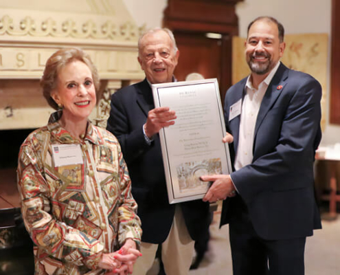 UGA Librarian and Associate Provost Toby Graham (right) presents the Dooley Friends of the UGA Libraries Award to Diana and Craig Barrow.