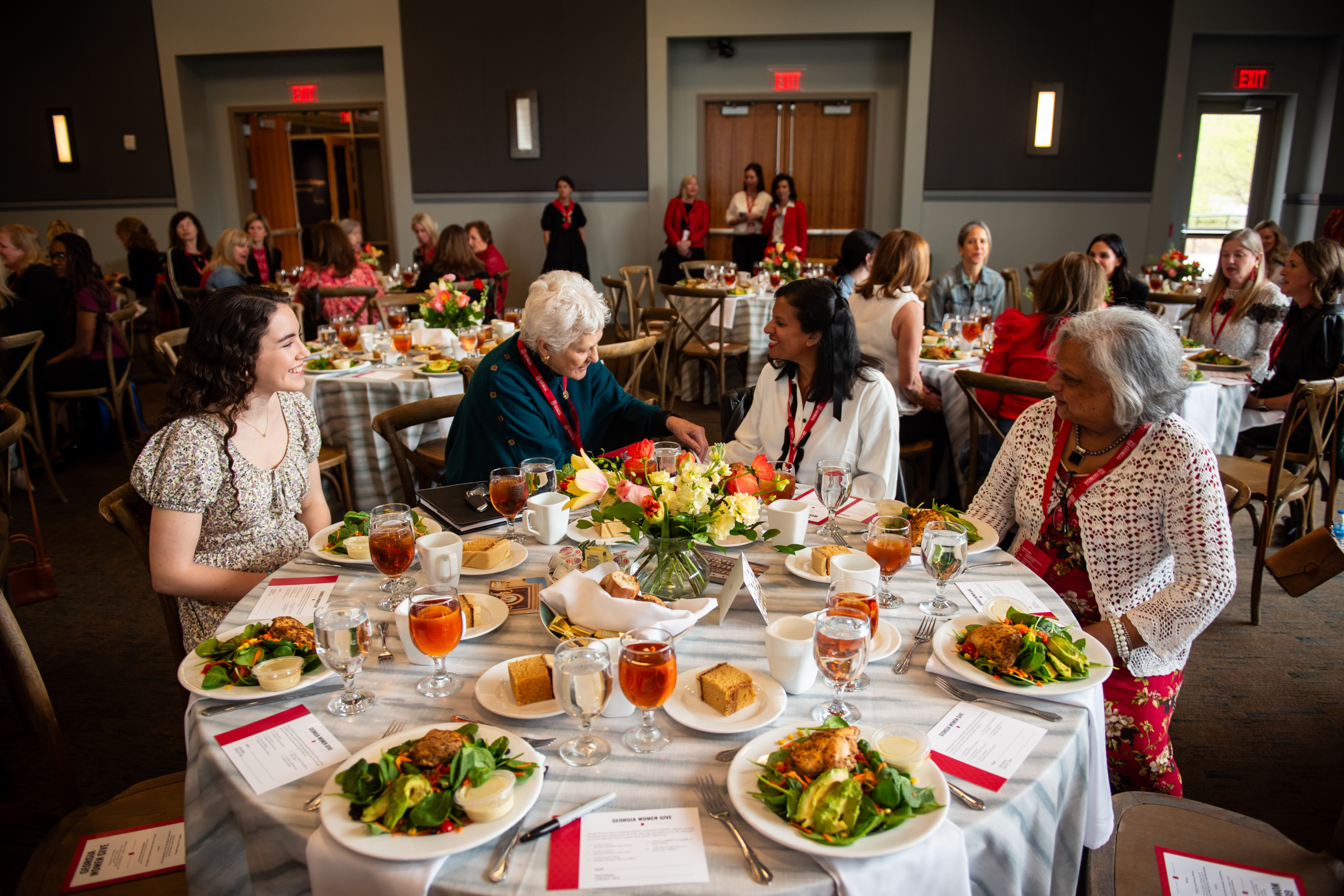 (L to R) UGA student Erin Thompson, GWG donors Sylvia McCoy Hutchinson, Supriya Donthamsetty, and Vani Donthamsetty at the Georgia Women Give 2024 Spring Luncheon.