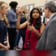 UGA President Jere Morehead speaks with two undergraduate students at the Center for Undergraduate Research 2025 Symposium.