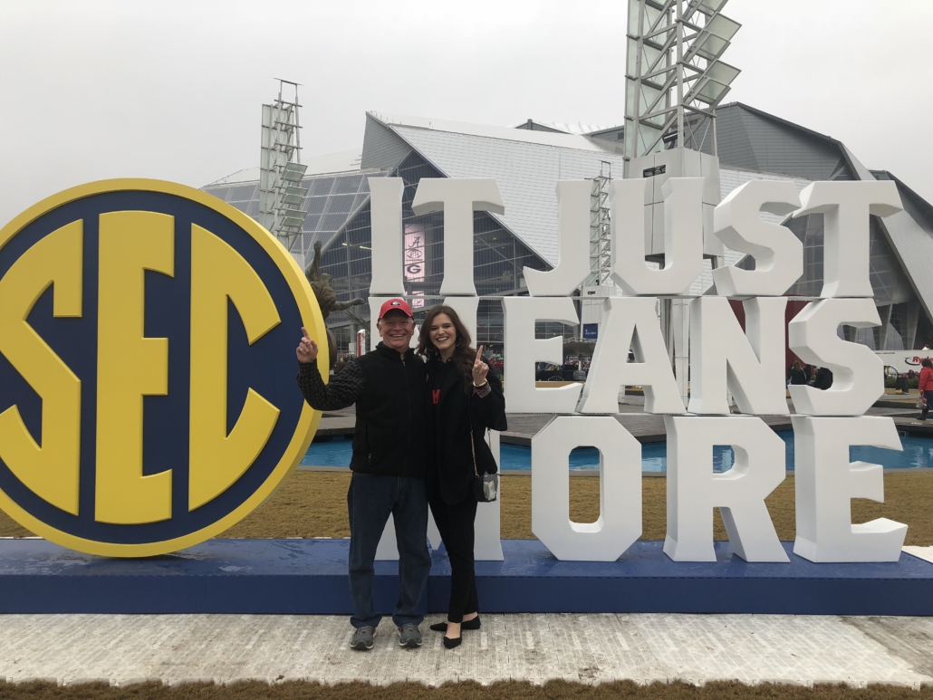 photo of Ashlee Nicole Tillery with her dad, Mark, at the SEC Championship game