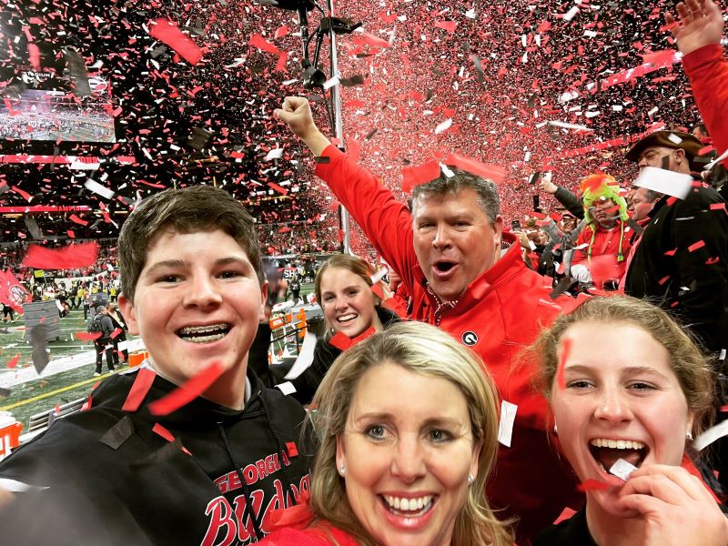 The Powell family celebrates the Bulldogs winning the NCAA National Championship.