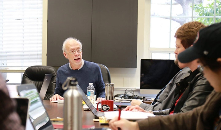 Dr. O'Toole teaches a doctoral capstone class in Baldwin Hall.