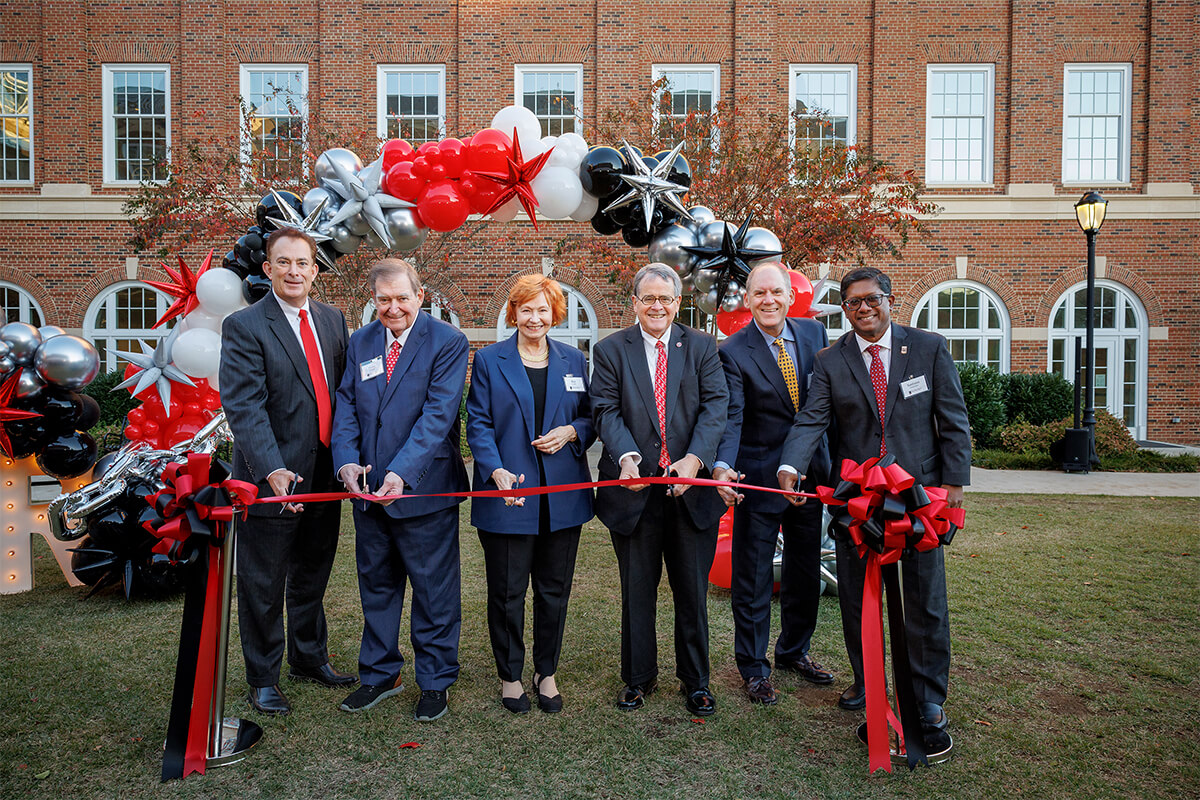 Dean Ben Ayers, Doug Ivester, Kay Ivester, President Jere W. Morehead, Chris Cornwell, and Santanu Chatterjee "cut the ribbon" on the Ivester Institute.