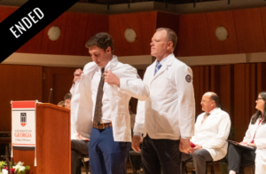 photo of Pharmacy student receiving their white coat