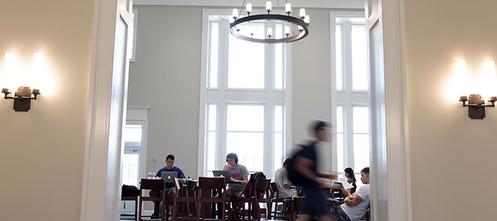 Students study for finals at Casey Commons inside Amos Hall.