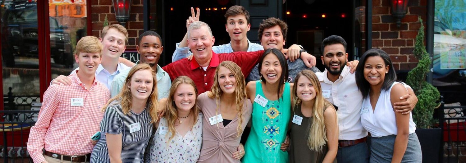 Dr. William McDonald with a group of students