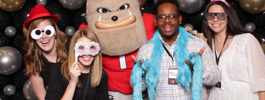 Staff members posing with Hairy Dawg