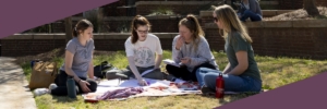 social work students gather on the lawn