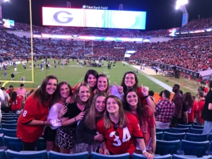 Natalie, at a Georgia-Florida game with friends