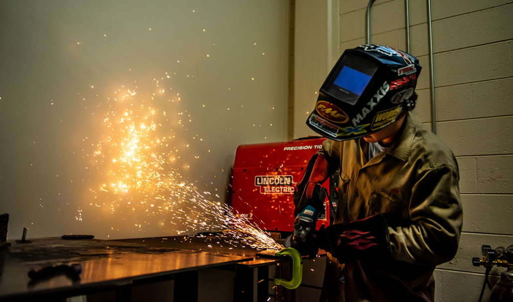 person welding